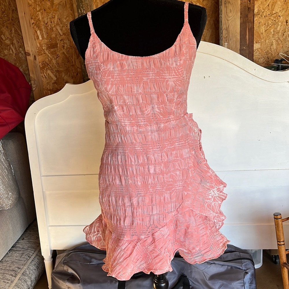 Lulus mini dress. Pretty pink. Size medium. Ruffle hem.